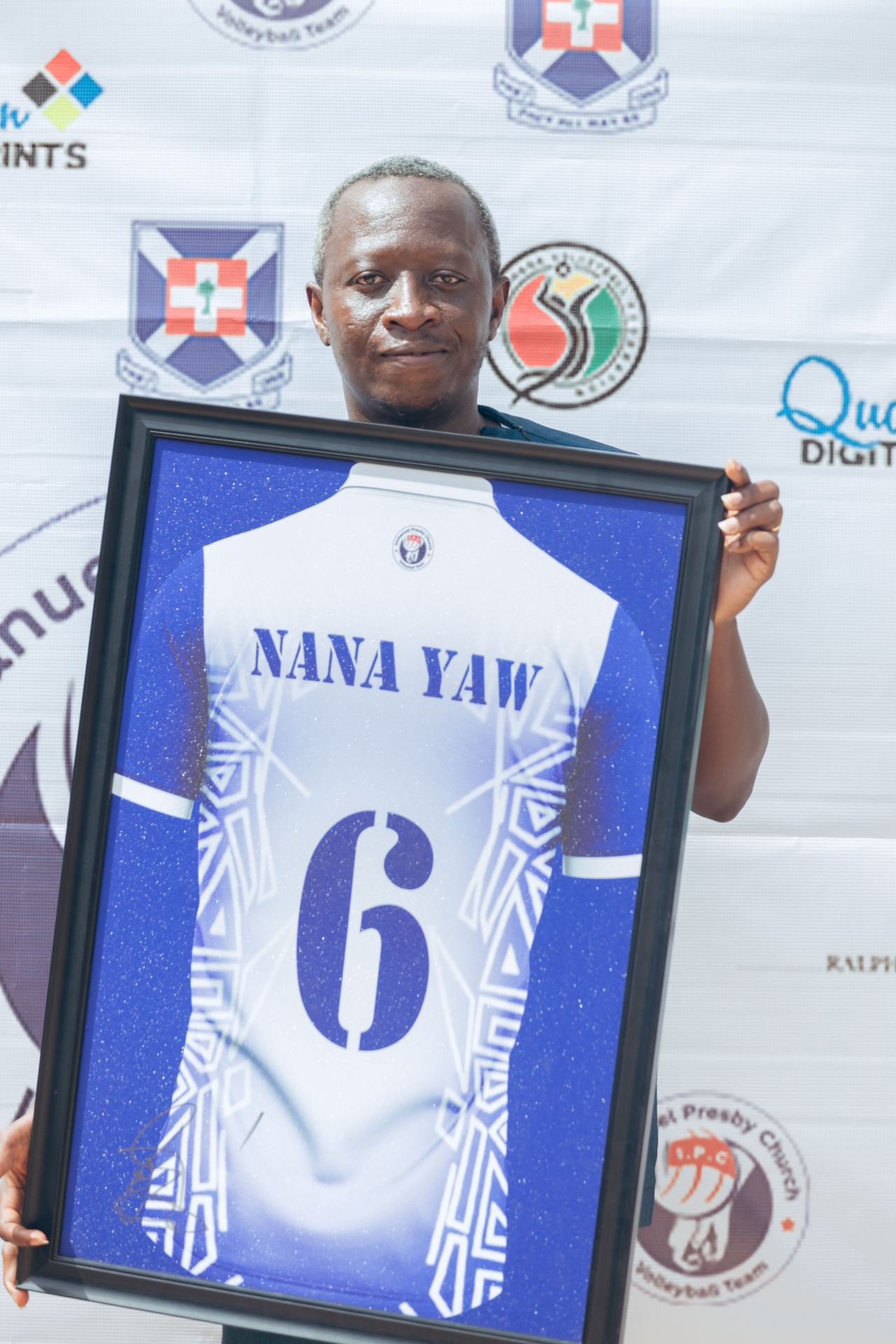 The framed Number 6 jersey, signed in honour of Nana Yaw