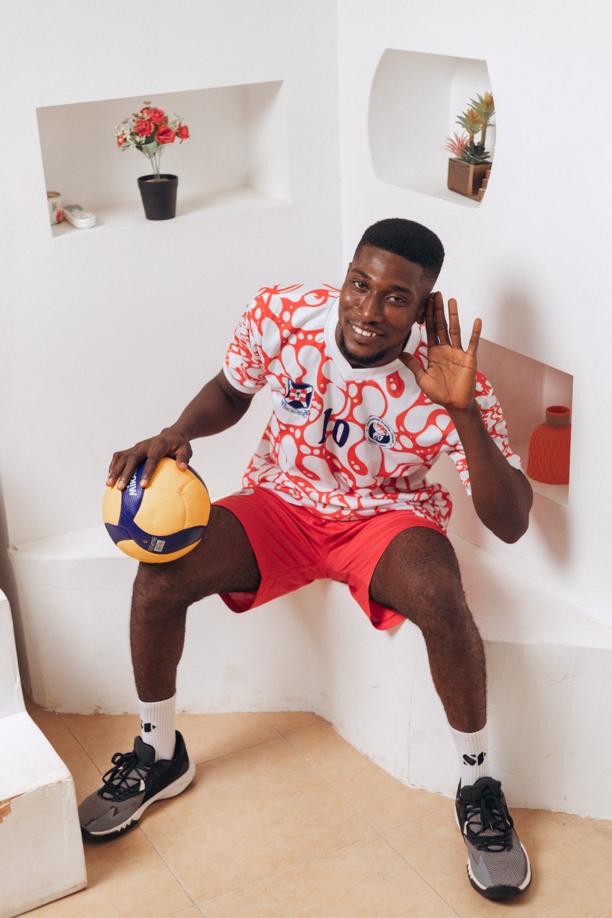 IPC player, red kit pose